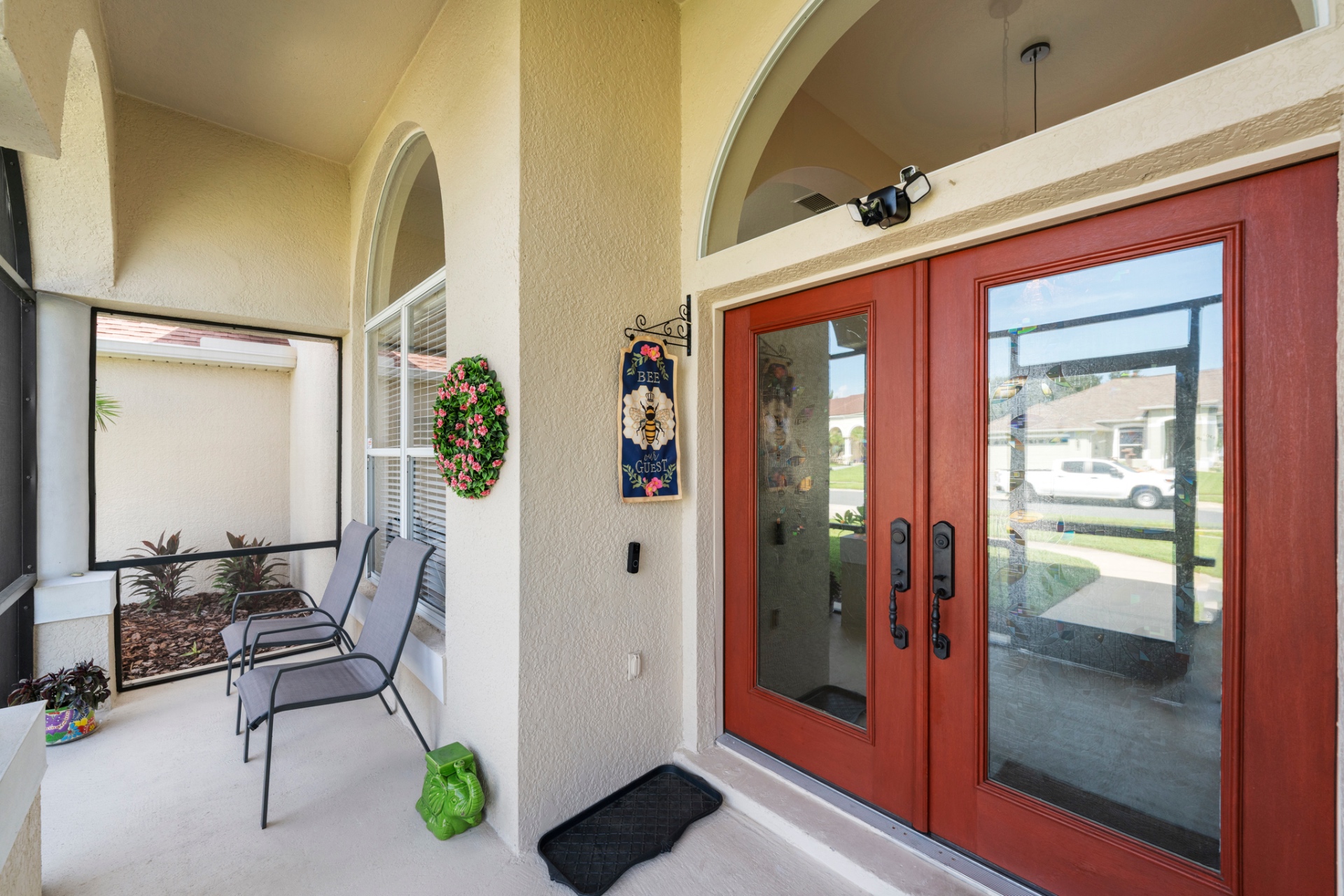 Covered front entry with double doors