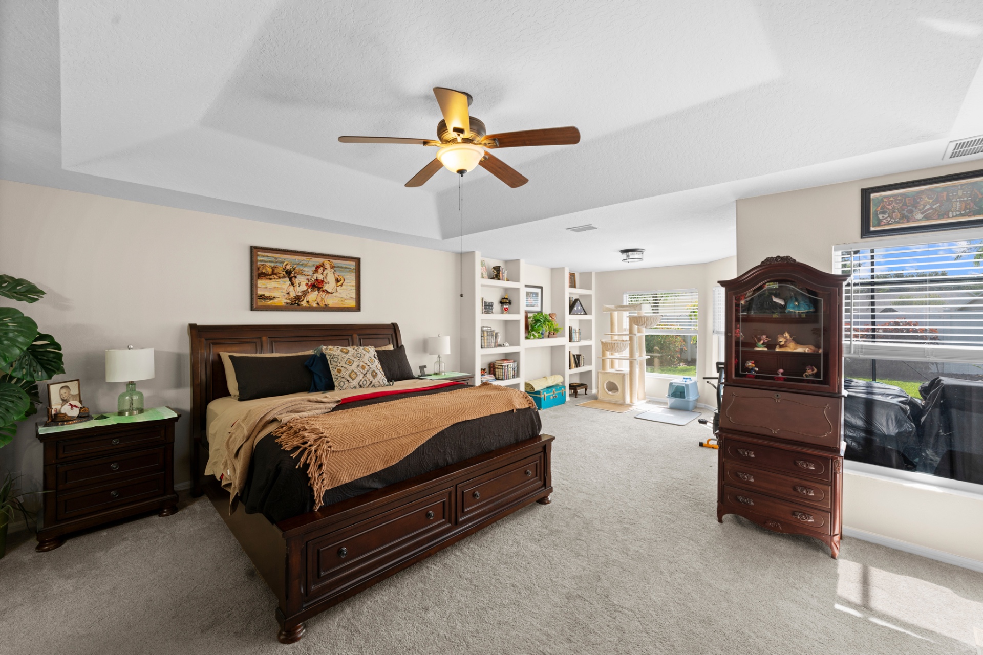 Primary bedroom with tray ceiling